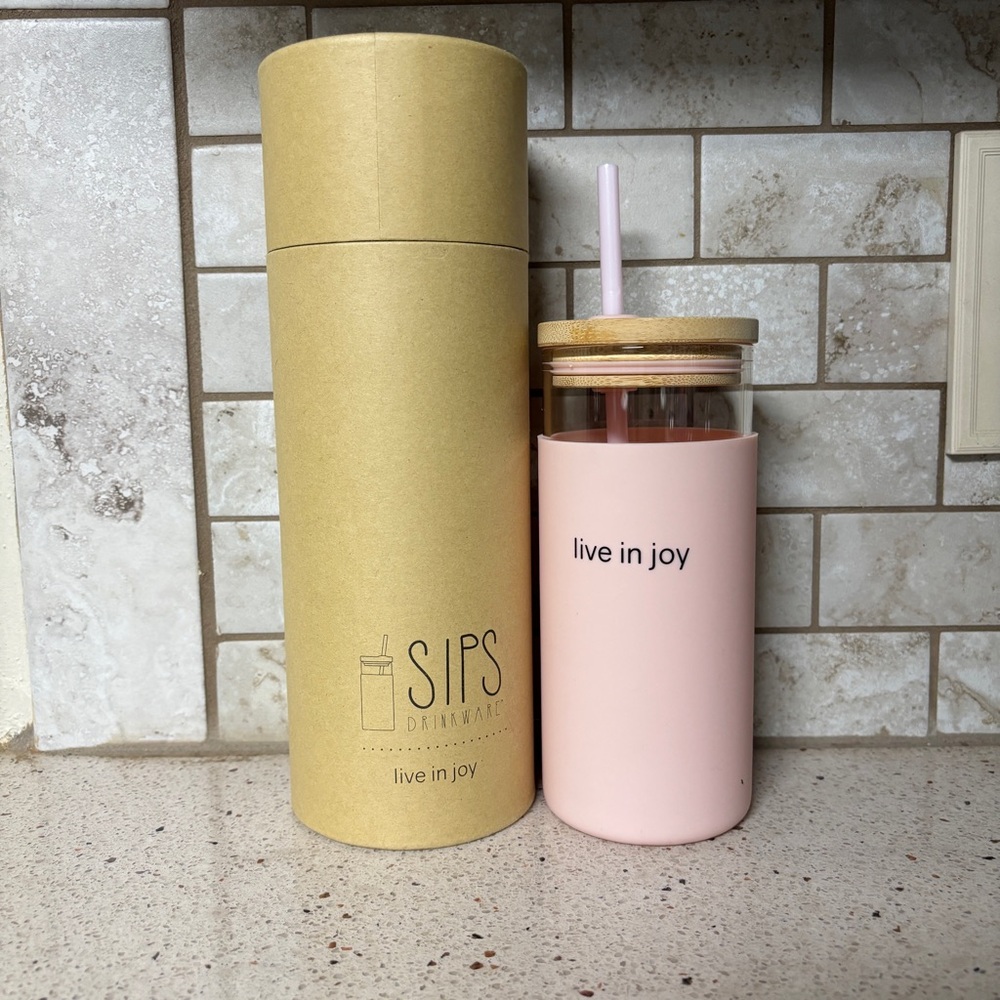 SIPS Live in Joy Glass Tumbler with pink silicone cover and Bamboo Lid